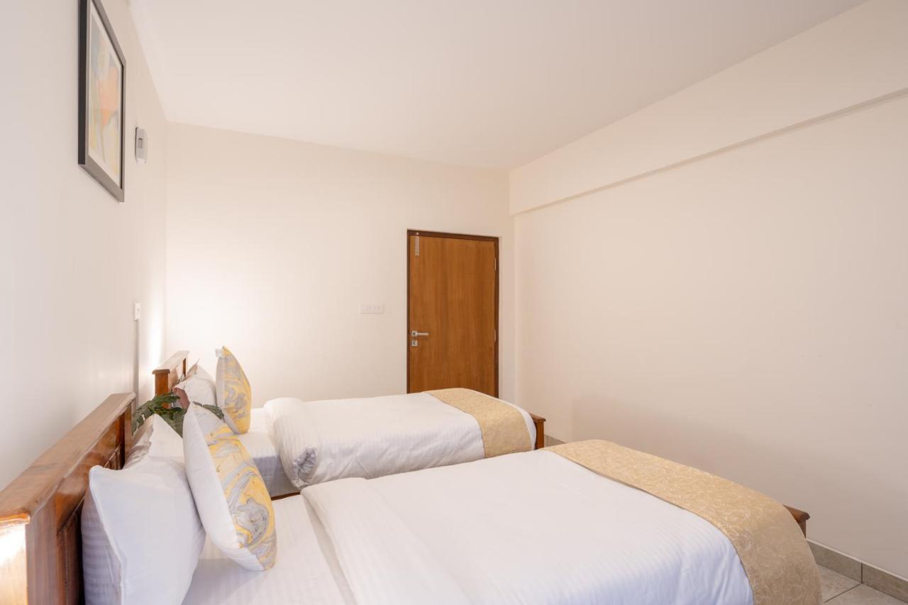 The Silver Chimes Suites Bangalore Esterno foto